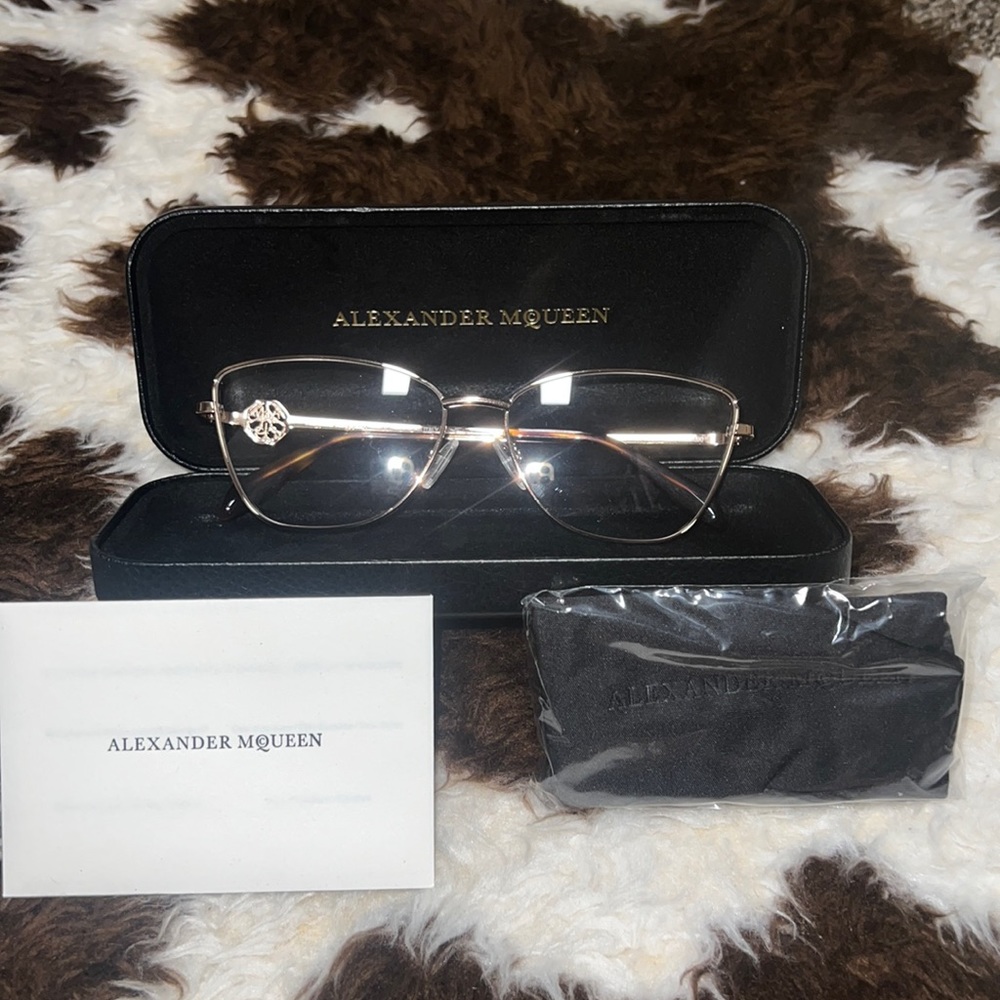 Brand new Alexander McQueen gold eye glasses